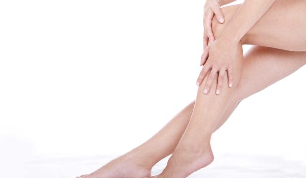 woman-applying-moisturizer-cream-legs